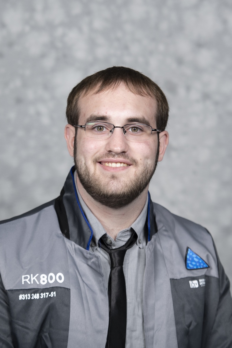 A headshot of Evan D. Minich